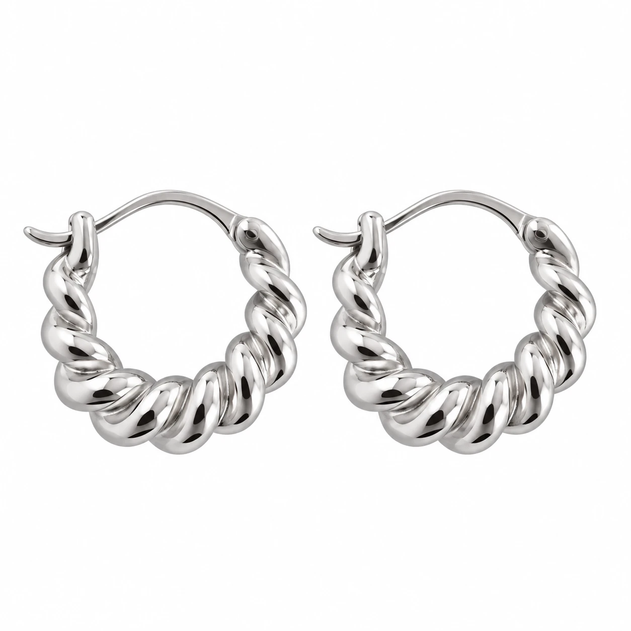 Swirl Creol RH 1 Swirl Creol RH – øreringe i rhodineret sølv med organisk kurvet design fra Spinning Jewelry.